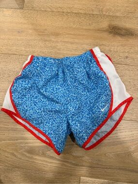 Girls Nike Blue Floral Print Athletic Shorts with Red Trim